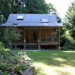 wooden-cottage-near-hill-01