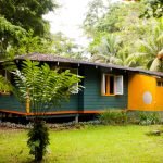 cottage-platform-in-tropical-gardens-01