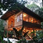 wooden-platform-cottage-in-natural-gardens-01